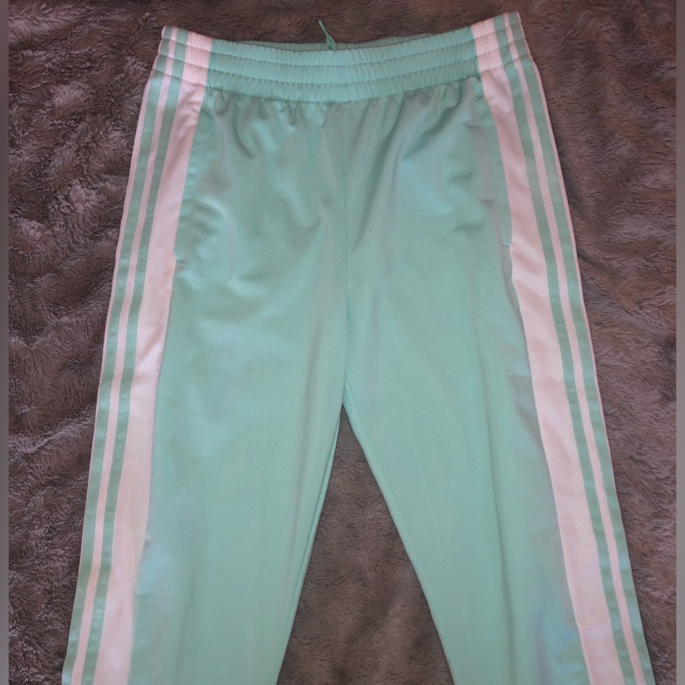 Adidas Mint Green Track Pants with White Stripes and Logo Detail on Pant Leg